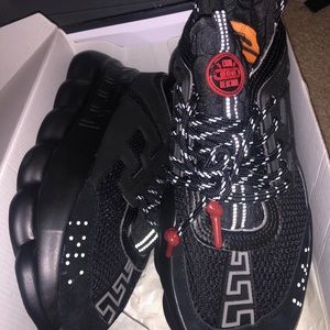 Versace chain reactions